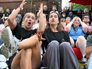 Footballers Maya Le Tissier, left, and Anna Patten attend a screening in St Albans of the England vs. Columbia quarter final match of the FIFA Women's World Cup.  (Jeff Spicer/PA Wire)
