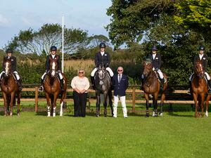 The Guernsey senior team for next week's Horse of the Year Show. The combinations are, left to right: Amy Parnwell, on Company Business, Justin Ogier on Zandokan, Sian Staples on Billy Mont Blanc, Sarah Jackson on Follyfoot Arkadia and Sophie Ephgrave on Jayley. Also pictured are chairman Debbie Ashwell and chef d'equipe Terry Lihou. (Picture by Peter Frankland, 32430620)