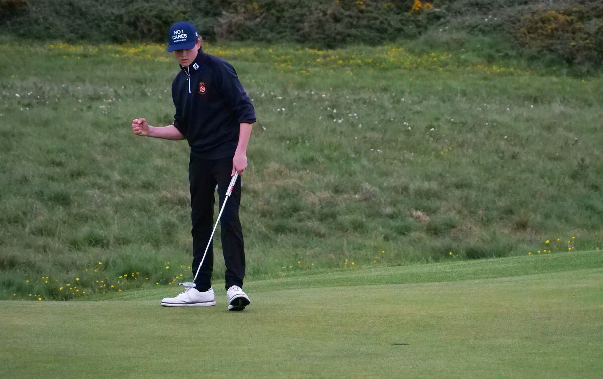Conor McKenna punches the air after holing a putt on the 14th to put him and his brother 3 up in the final. ( 32087246)