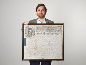 Jack Wallis, works of art specialist at Roseberys Auctioneers, with the letter of marque issued by George III in 1878. (32357860)
