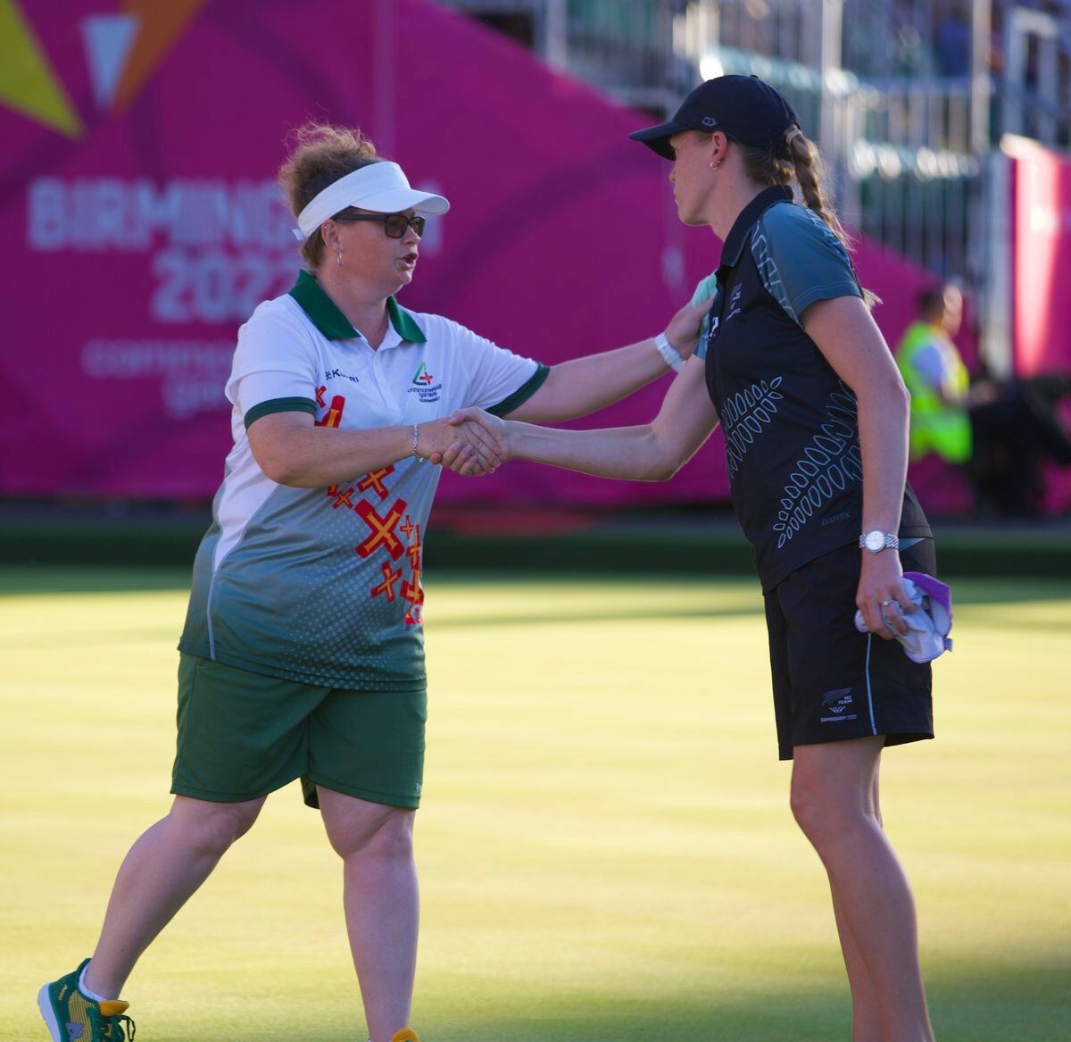 Lucy Beere shakes hands with Katelyn Inch of New Zealand after their women's singles quarter-finals. (Picture by Tony Curr, 31093603)