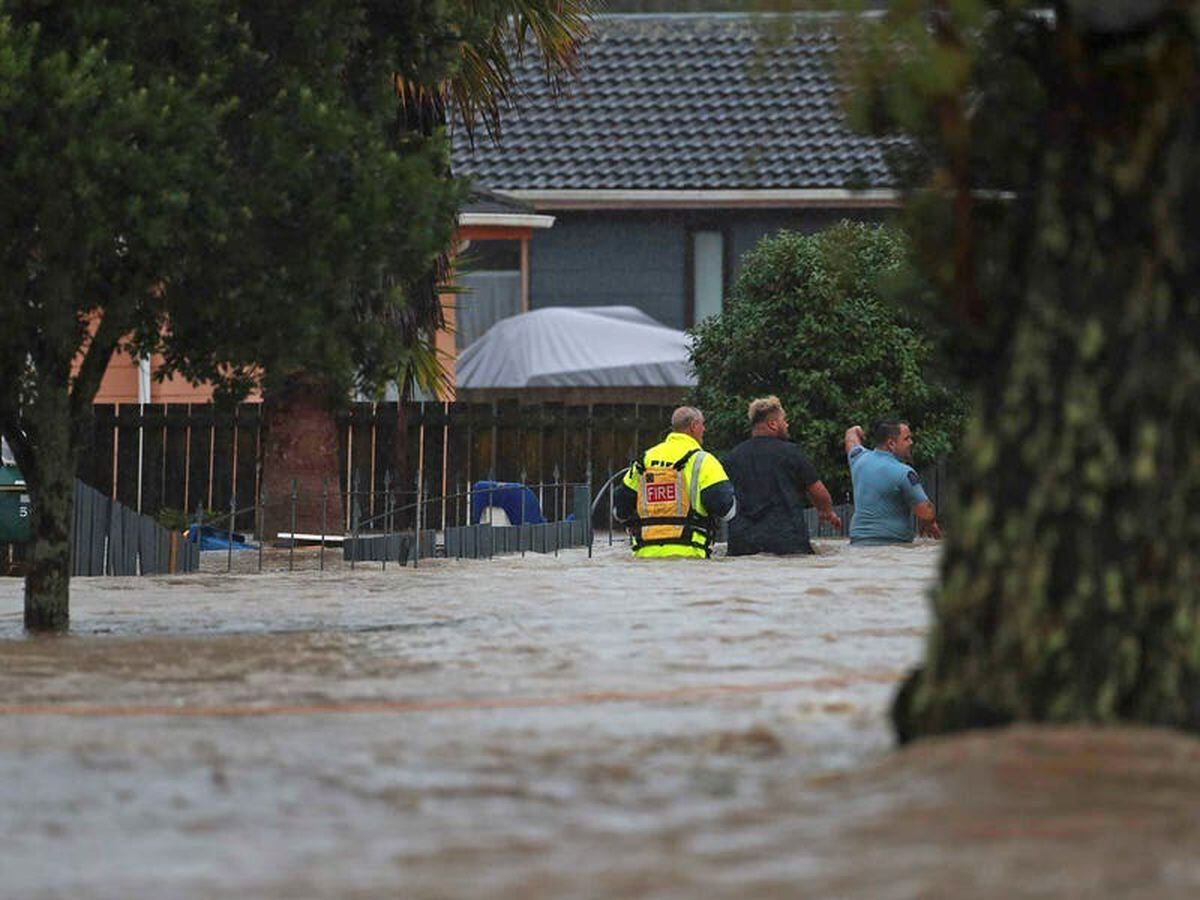 Record rainfall in New Zealand’s largest city leaves at least three dead
