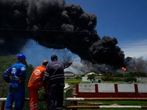 Firefighters battle big blaze at Cuba tank farm for second day