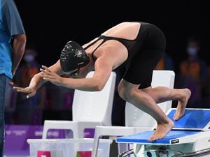 Orla Rabey dives into the water yesterday at the Sandwell Aquatics Centre where she broke the Island women's 100m long-course freestyle record. (Picture by David Ferguson, 31096689)