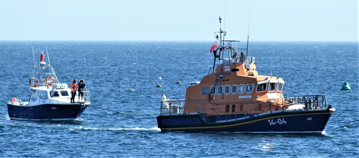 An ignominious end to the first passenger-carrying voyage of the new Alderney ferry, the Azula, operated by Alderney Ferry Services, which had to be towed in by the RNLI lifeboat, Roy Barker I, after breaking down with engine problems yesterday morning. (Picture by David Nash)