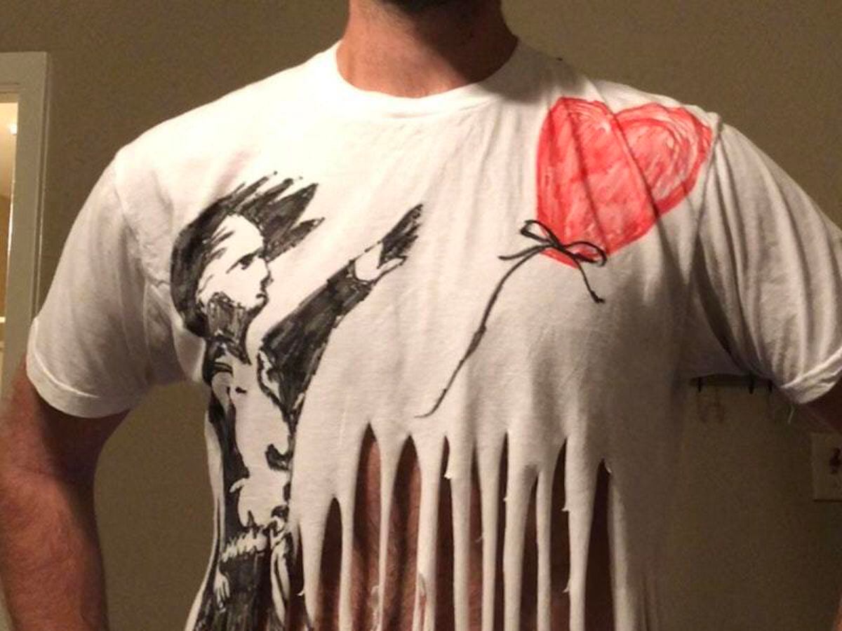 banksy shredded shirt