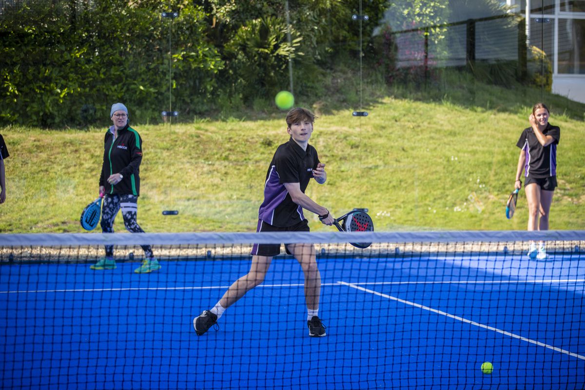 There are concerns that if the Sports Commission loses funding, sports such as padel will no longer be available. St Sampson’s high school students are pictured enjoying attending a padel session at the Tennis Club. Mason Prigent, 15, hits the ball. 			 (Picture by Luke Le Prevost, 32102359)