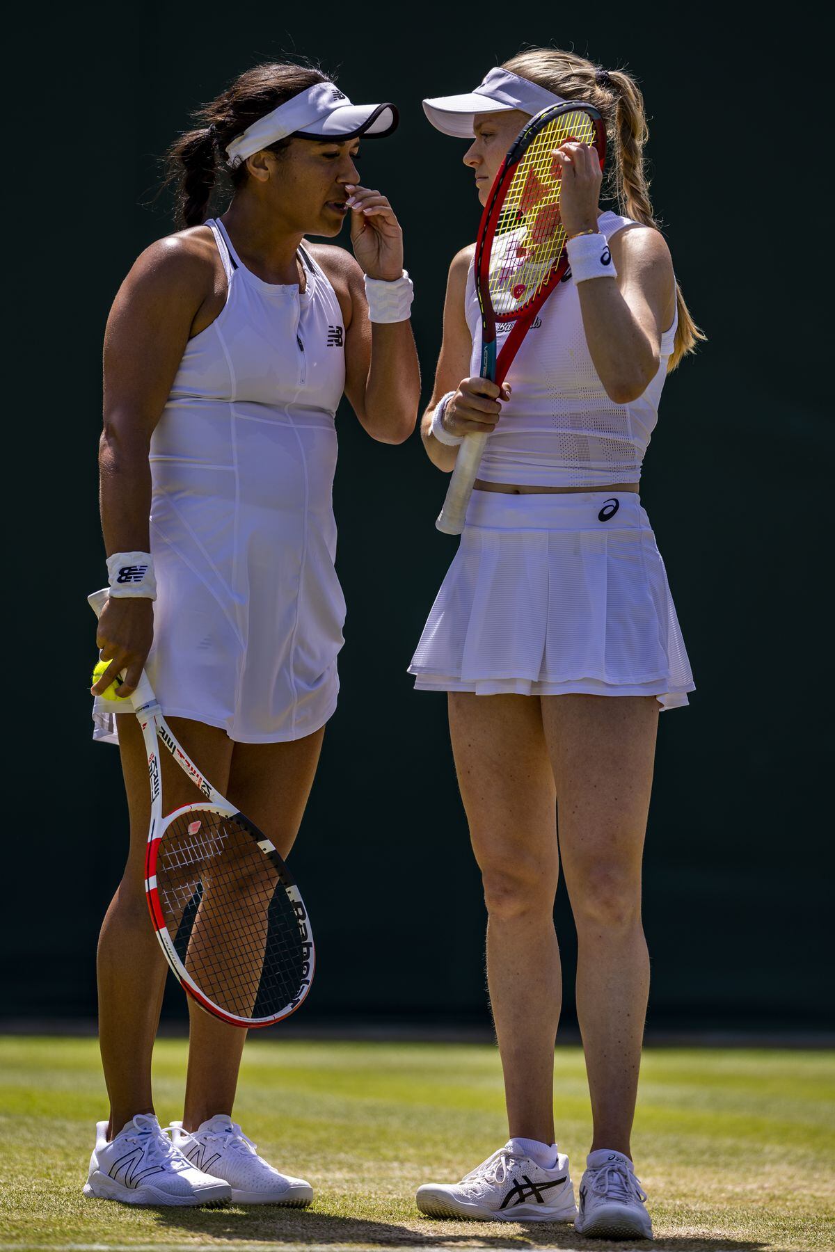 Doubles chat: Heather Watson and Harriet Dart in yesterday's last 16 match. (Picture by Press Association, 30997126)