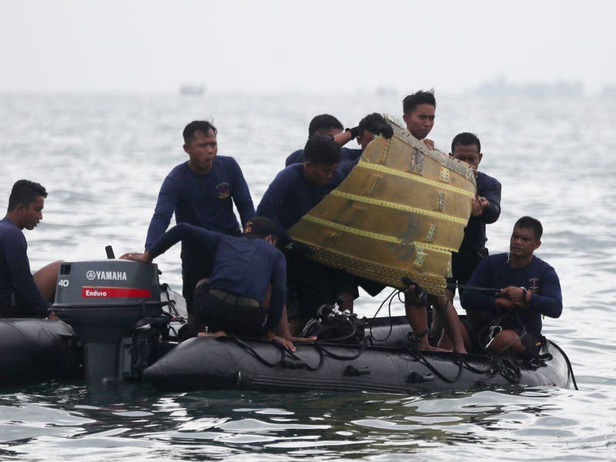 Indonesia intensifies search for crashed plane’s black boxes
