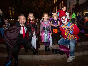 Picture by Sophie Rabey.  31-10-22.   St Peter Port town stayed open for an hour for Halloween trick-or-treat, organised by Iris and Dora and the Smile for Georgie Foundation.  .L-R Lee Jalowiec, Evie Jalowiec (7), Ava Jalowiec (7), Imogen Bold (6) and Chris Bold.. (31429271)