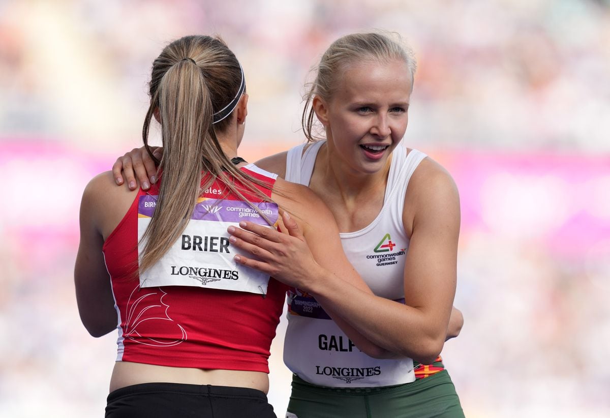 Guernsey's Abi Galpin (right) and Wales' Hannah Brier after heat three of the first round of the Women's 100 metres at Alexander Stadium on day seven of the 2022 Commonwealth Games in Birmingham. Picture date: Thursday August 4, 2022. (Picture PA, 31112524)