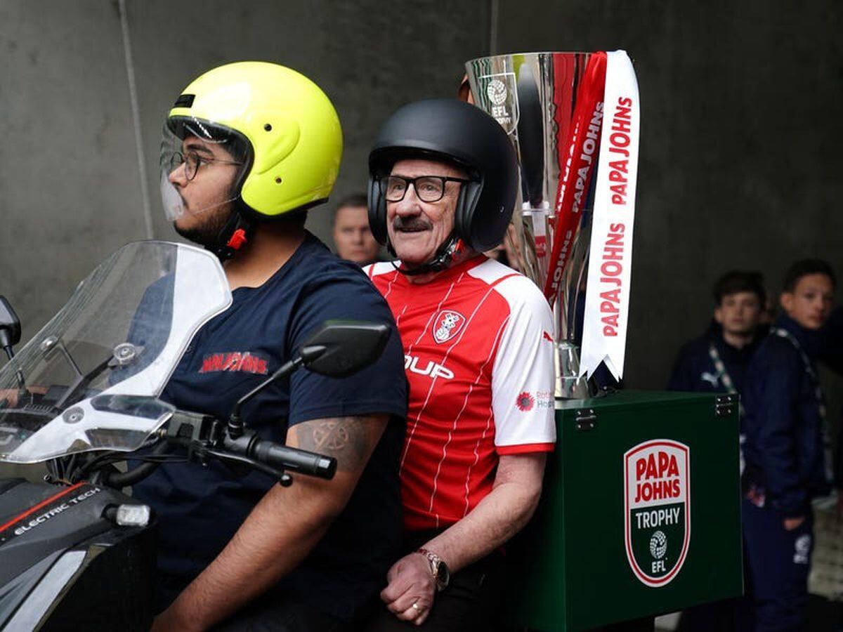Paul Chuckle and Tim Vine deliver Wembley football trophy on takeaway bikes
