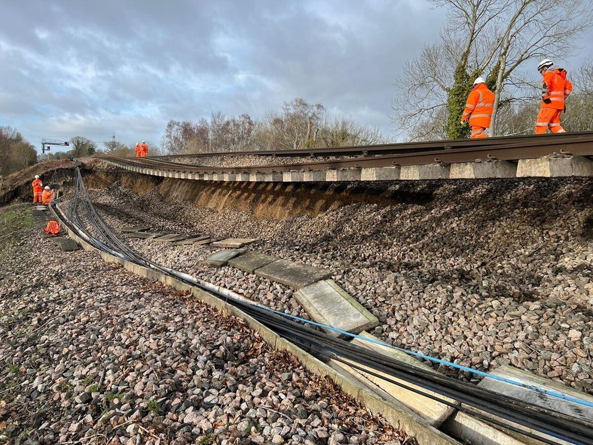 The landslip near Hook has left one track hanging in mid-air and has damaged another. (Picture courtesy of Network Rail)
