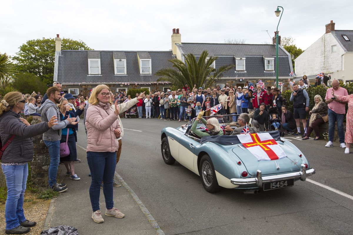 Liberation Day celebrations in St Andrew’s last year, as parishioners wave to the cavalcade. (30419420)