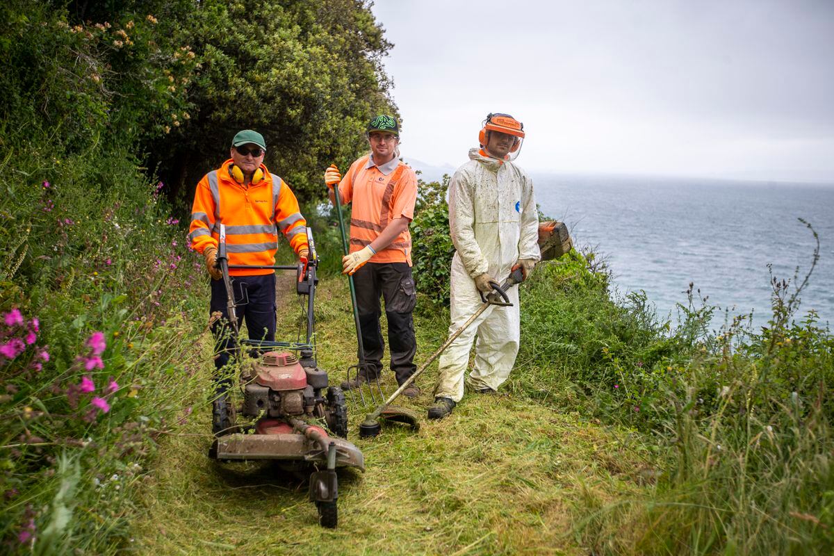 Pathways around Bec du Nez and Marble Bay are being strimmed and cleared by States Works in preparation for the upcoming Saffery Rotary Walk. Left to right, groundsmen Russ Sarre, Matthew Smith and Josh Baudains. (Picture by Luke Le Prevost, 32172262)