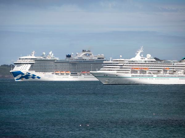 The Regal Princess, left, on one of her 10 visits in 2023, alongside another Princess Cruises ship, the Artania. (Picture by Luke Le Prevost, 32589212)