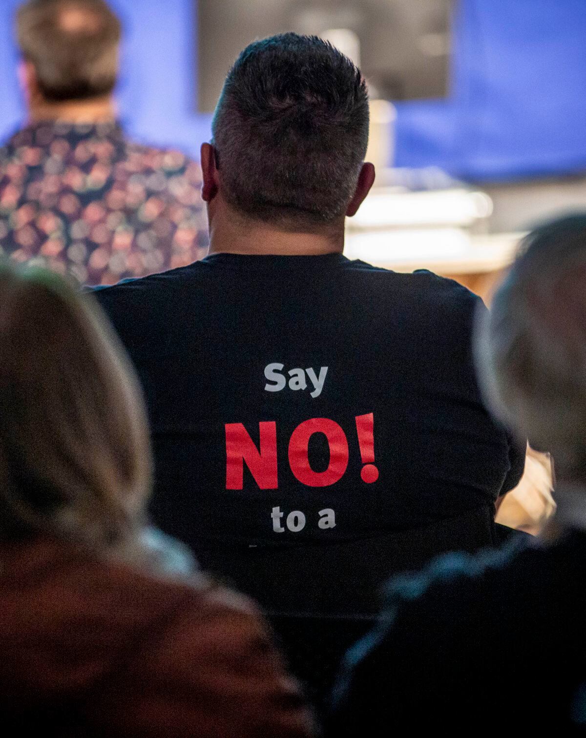 A member of the audience makes his view on the proposed introduction of a GST known: ‘Say NO! to a General Sales Tax’.                                           (Picture by Peter Frankland, 31518948)