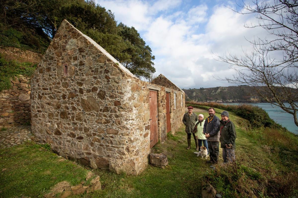 Planning permission has been granted for a derelict cottage at Moulin Huet, which featured in a Renoir painting, to be restored and used as self-catering accommodation. Pictured, left to right, architect Andrew Dyke with owners Maisie, Nik and George Le Page with their dog Petra.(Picture by Peter Frankland, 30233161)