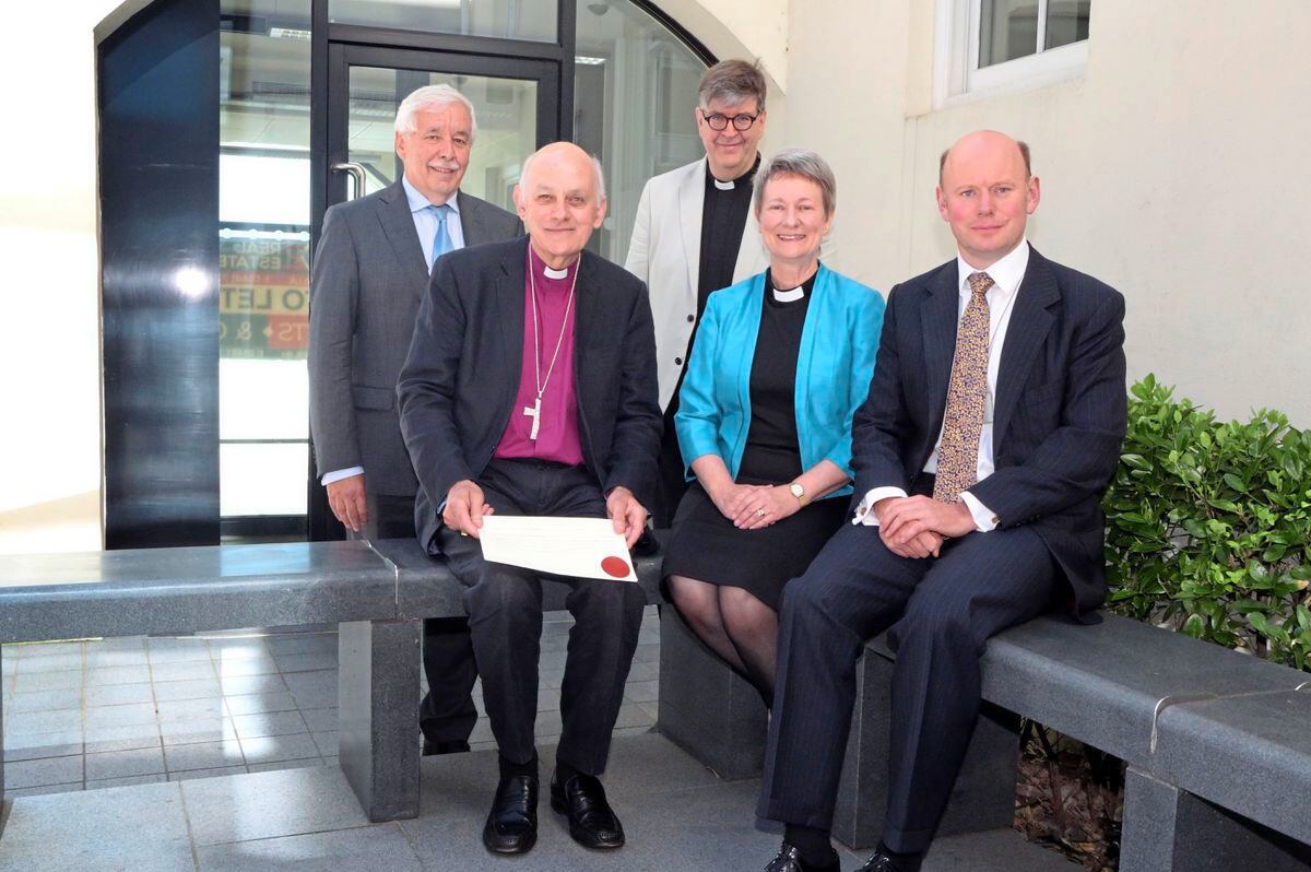Juliette Robilliard has been appointed chaplain of the GFSC by the Bishop of Dover. Left to right are GFSC chairman Cees Schrauwers, Bishop of Dover Trevor Willmott, Dean of Guernsey the Very Rev. Tim Barker, the Rev. Robilliard and director-general of the GFSC William Mason. 											                             (Picture by Steve Sarre, 22174618)