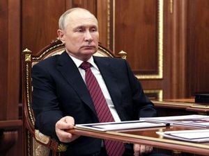 Putin signs laws completing Russian annexation of four Ukrainian regions