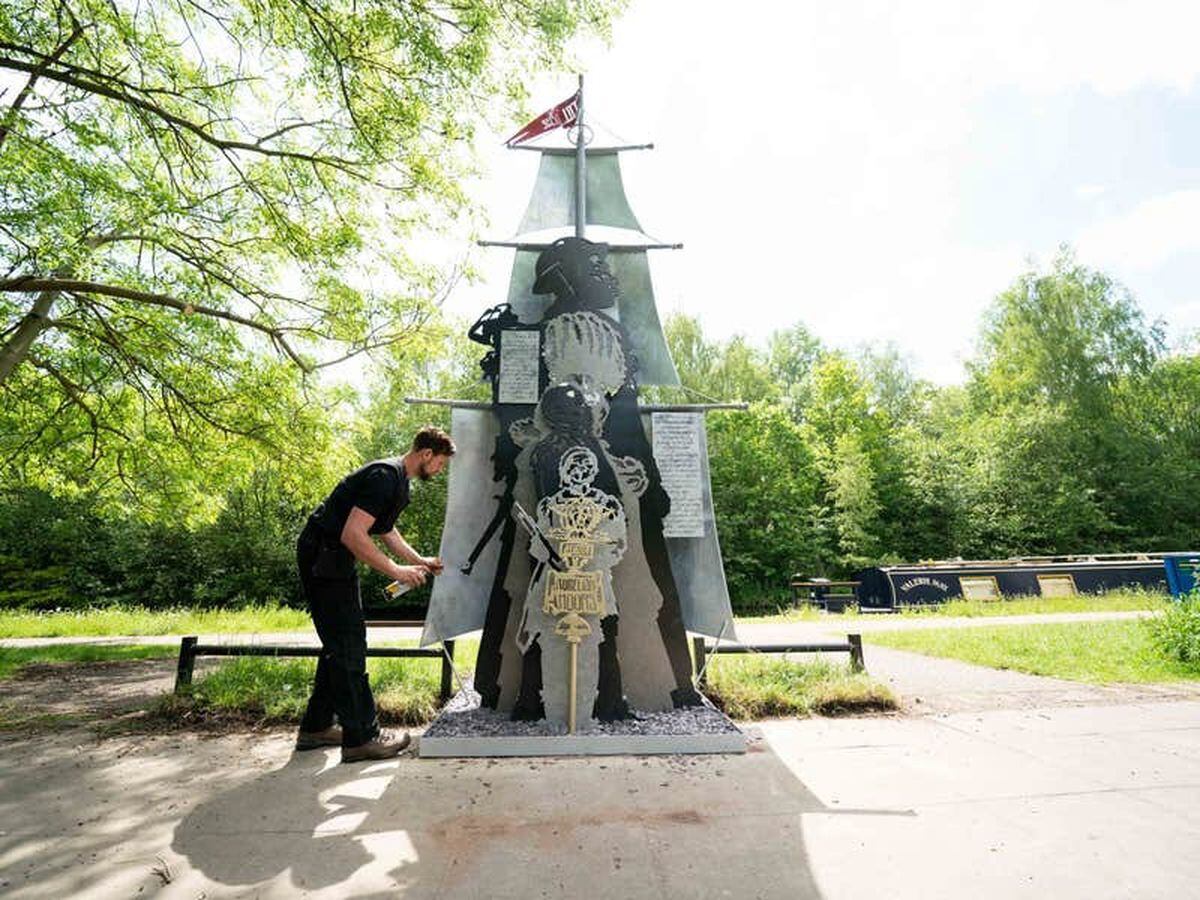 Artists defiant after black history sculpture defaced days after being unveiled