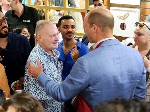 Prince of Wales kissed by Gazza during visit to Pret