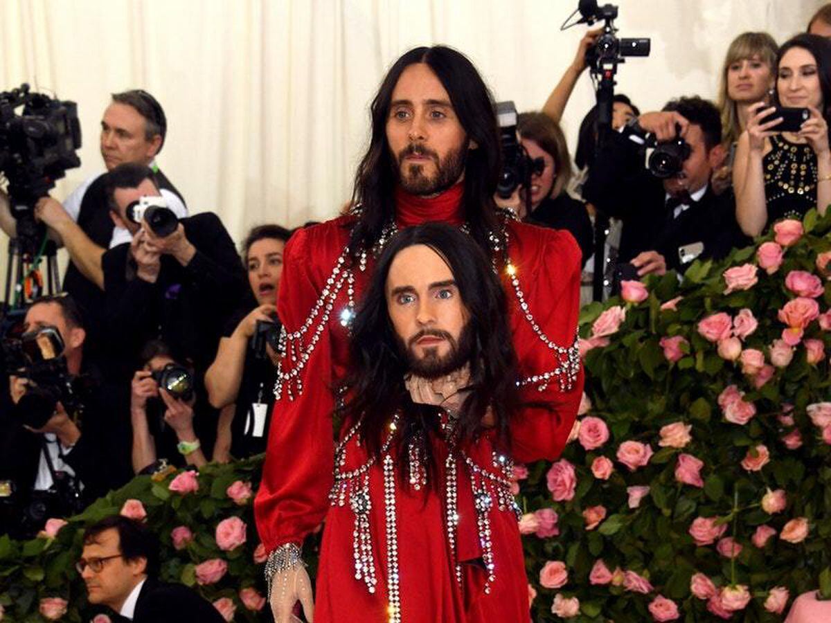 Jared Leto carries a model of his head at the Met Gala Guernsey Press