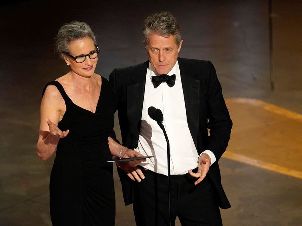 Hugh Grant lauds Andie MacDowell’s ‘good moisturiser’ while reuniting at Oscars