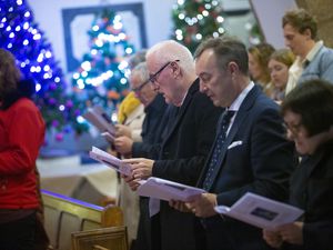 Chief Minister Deputy Peter Ferbrache and head of public service Mark de Garis were among those attending yesterday’s annual States carol service, which some members missed due to Covid. (Picture by Peter Frankland, 31588513)